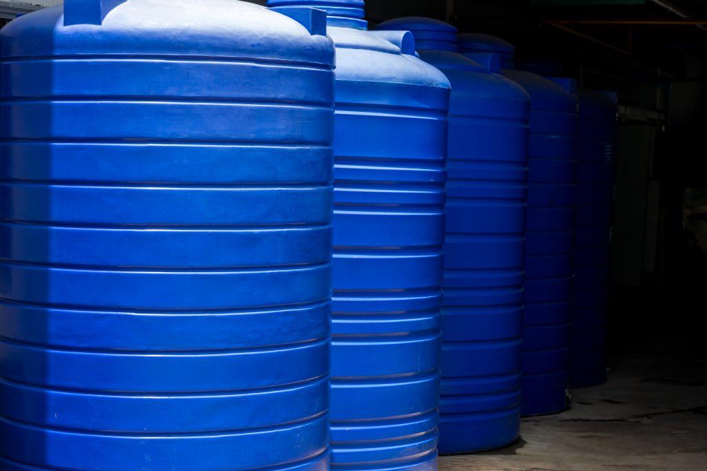 blue water tank of industrial building. water storage tanks. wat